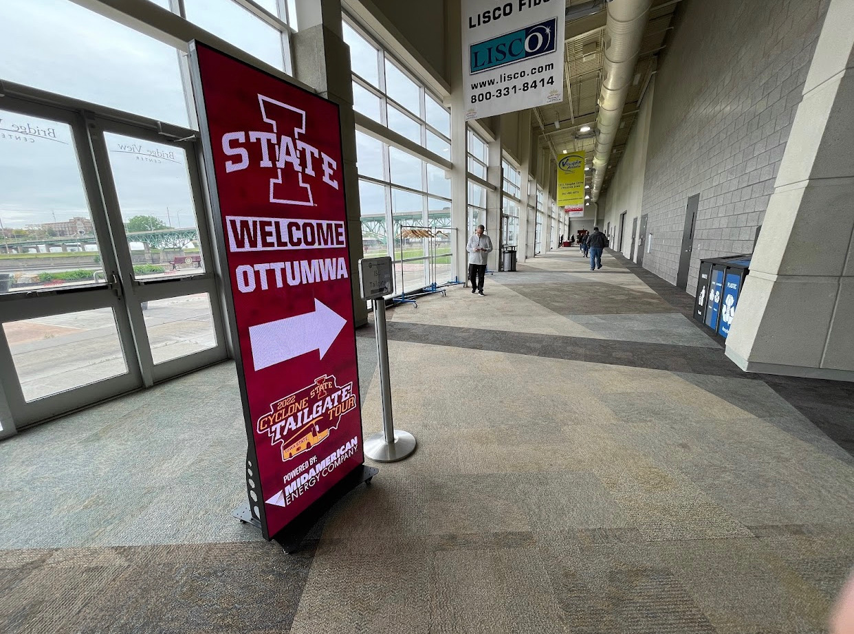 an led poster for Iowa State set up inside one of their university buildings